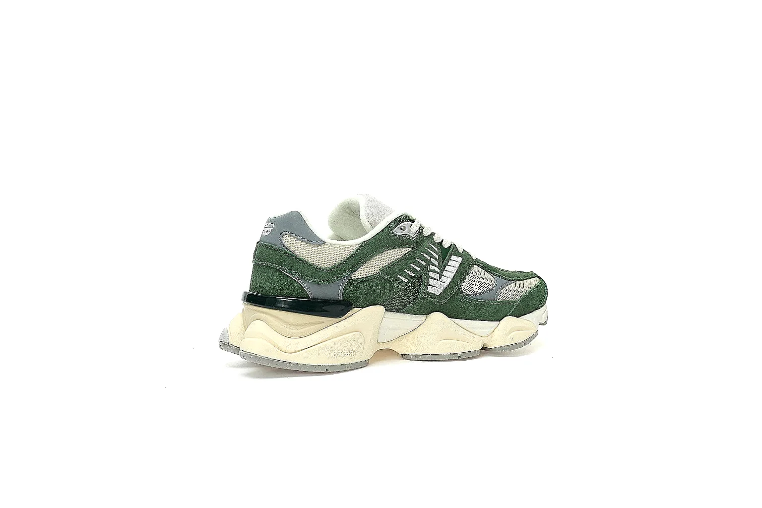 New Balance green cream runner with visible N logo and chunky sole proof