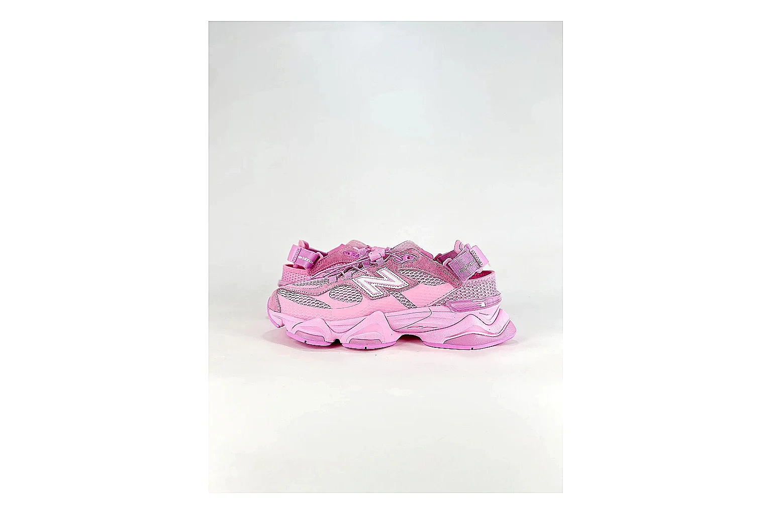 New Balance 9060 Pink Sneakers comparison signal photo with pink chunky runner sneakers with mesh-leather texture, side-profile shape, upper panel lines, and outsole detail