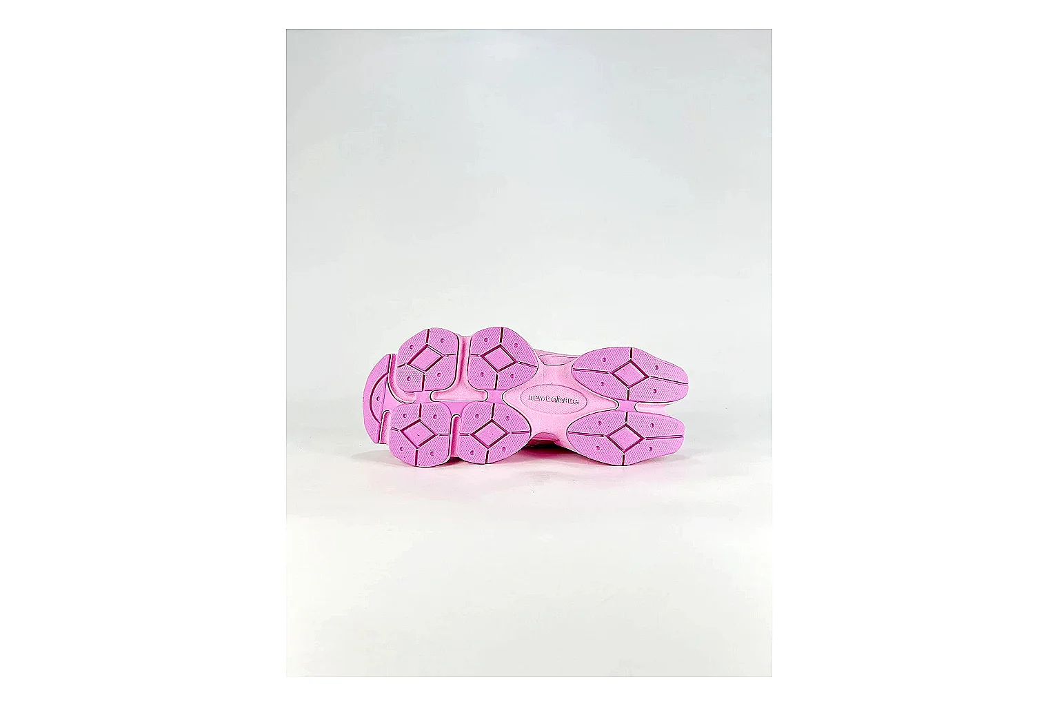 New Balance 9060 Pink Sneakers comparison signal photo with pink chunky runner sneakers with mesh-leather texture, side-profile shape, upper panel lines, and outsole detail thumbnail 4