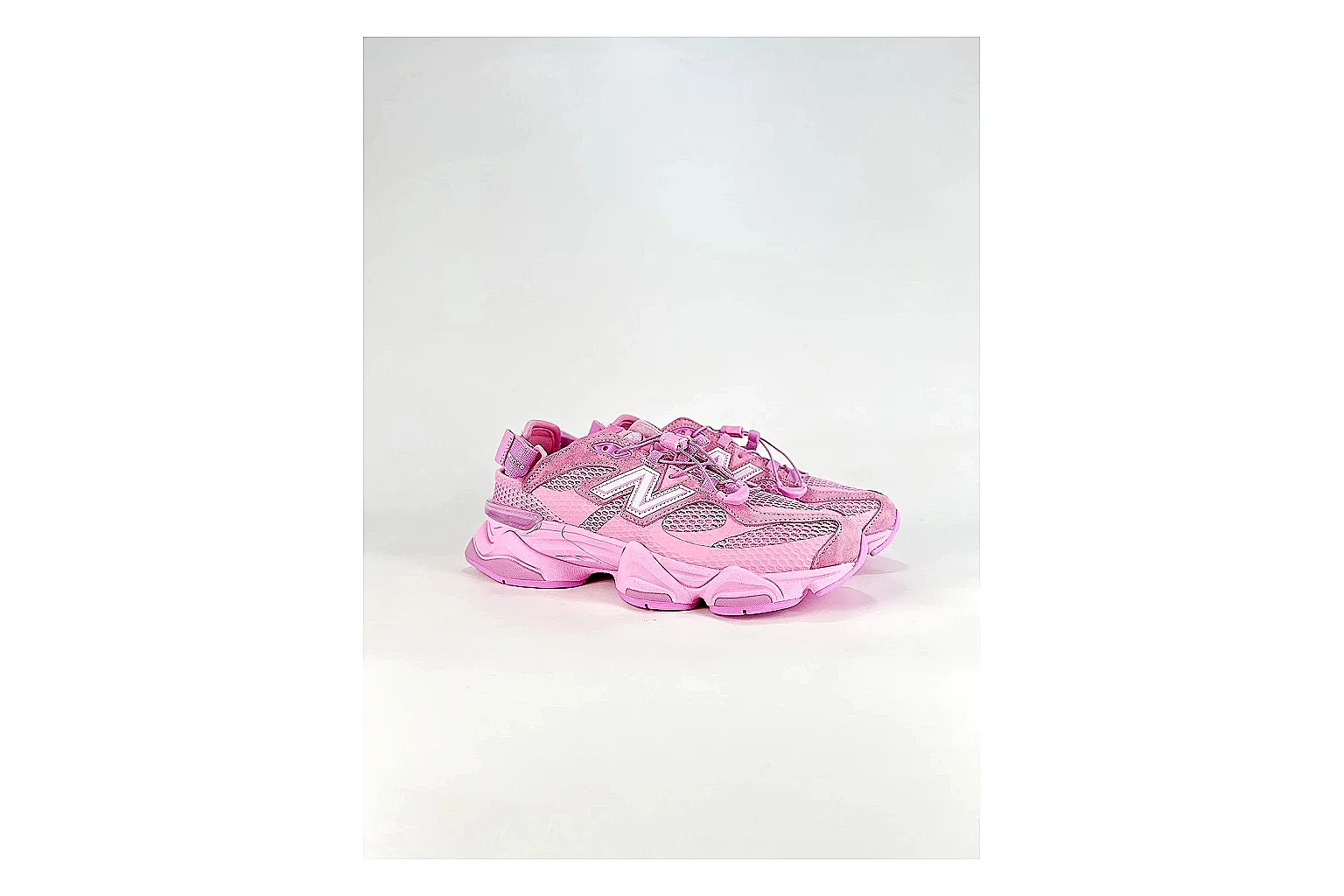 New Balance 9060 Pink Sneakers comparison signal photo with pink chunky runner sneakers with mesh-leather texture, side-profile shape, upper panel lines, and outsole detail thumbnail 6