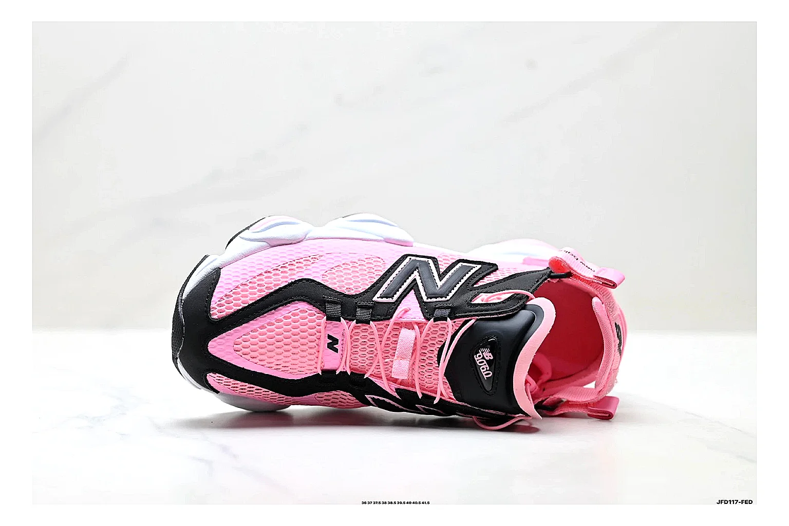 New Balance 9060 Pink Black Sneakers comparison signal photo with pink black chunky runner sneakers with mesh-leather texture, side-profile shape, upper panel lines, and outsole detail thumbnail 2