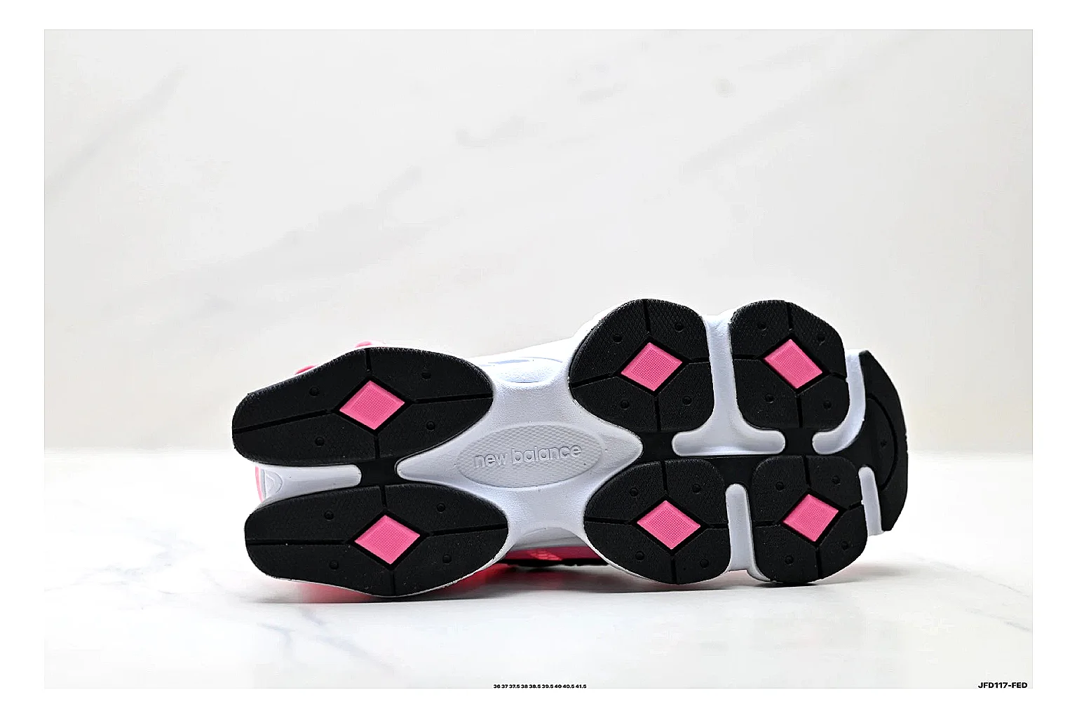 New Balance 9060 Pink Black Sneakers comparison signal photo with pink black chunky runner sneakers with mesh-leather texture, side-profile shape, upper panel lines, and outsole detail thumbnail 4