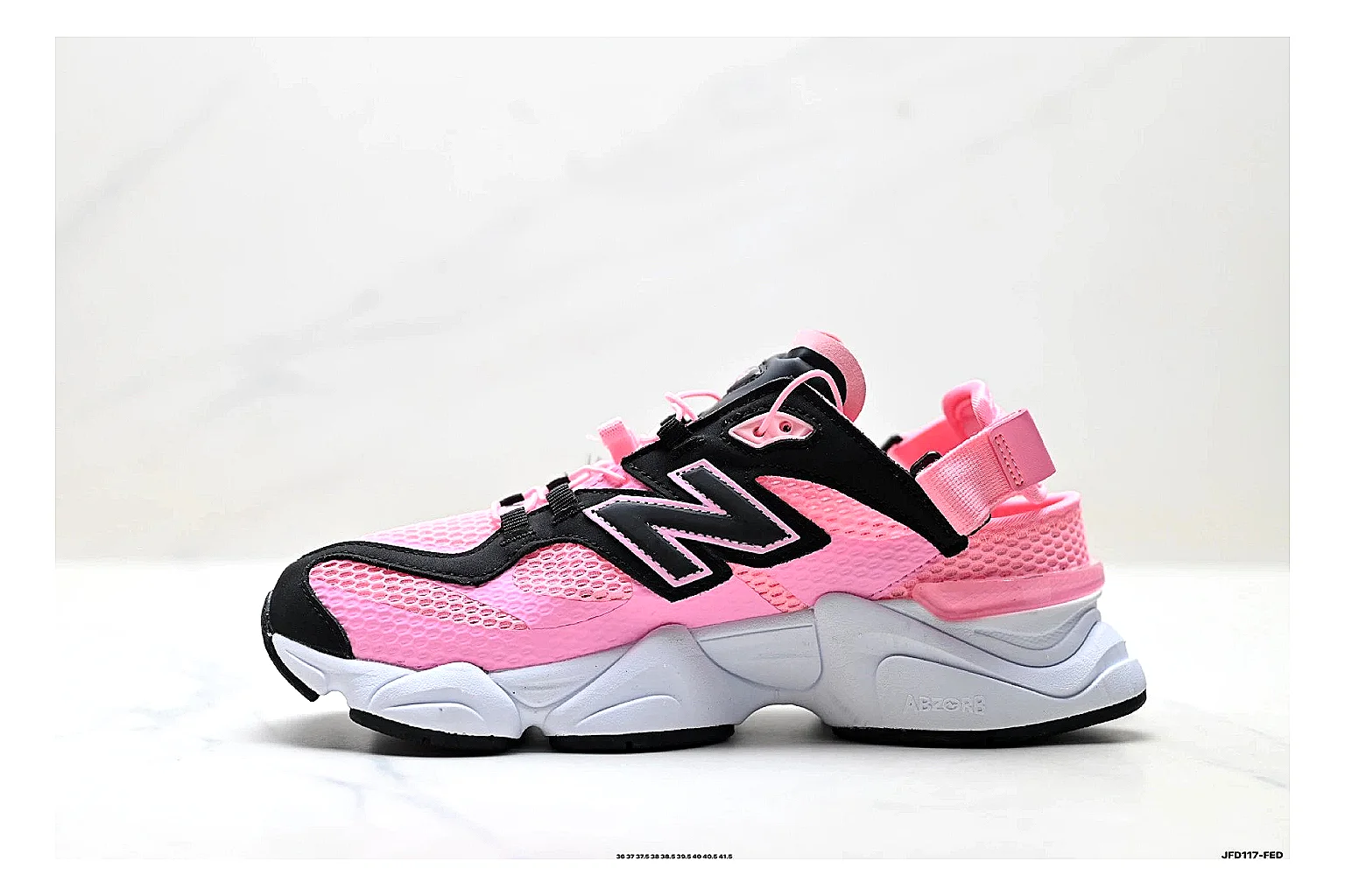 New Balance 9060 Pink Black Sneakers comparison signal photo with pink black chunky runner sneakers with mesh-leather texture, side-profile shape, upper panel lines, and outsole detail thumbnail 6