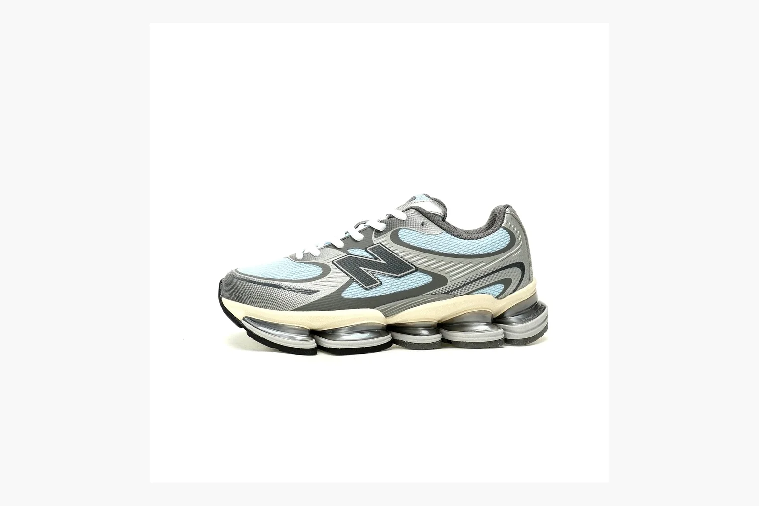 New Balance 9060 Runner Sneaker Silver Teal comparison signal image with silver and teal NB 9060 runner with chunky sole, mesh panels, and side N logo