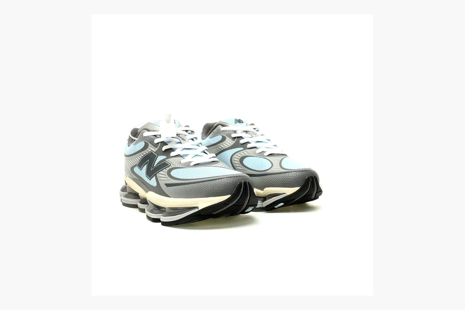 New Balance 9060 Runner Sneaker Silver Teal comparison signal image with silver and teal NB 9060 runner with chunky sole, mesh panels, and side N logo thumbnail 4