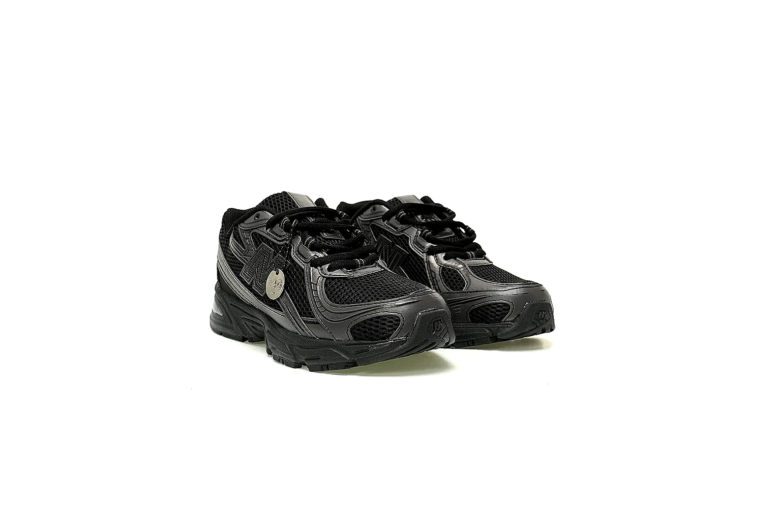 New Balance black low-top runner with ABZORB heel detail and six QC angles thumbnail 4