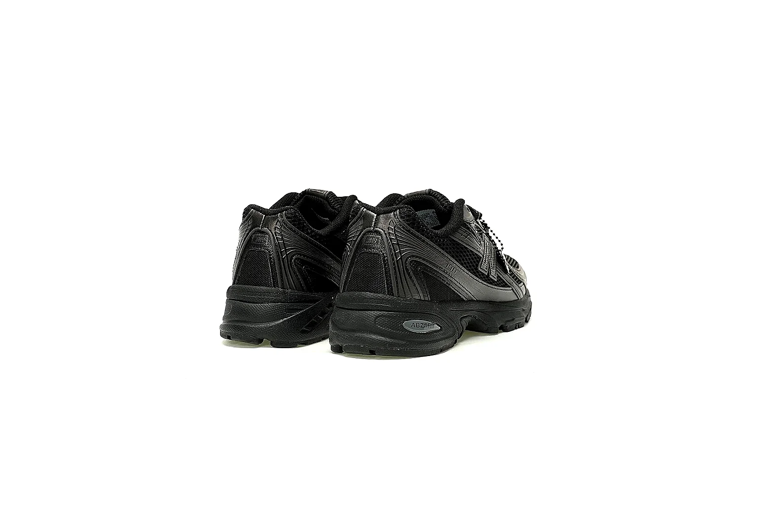 New Balance black low-top runner with ABZORB heel detail and six QC angles thumbnail 5