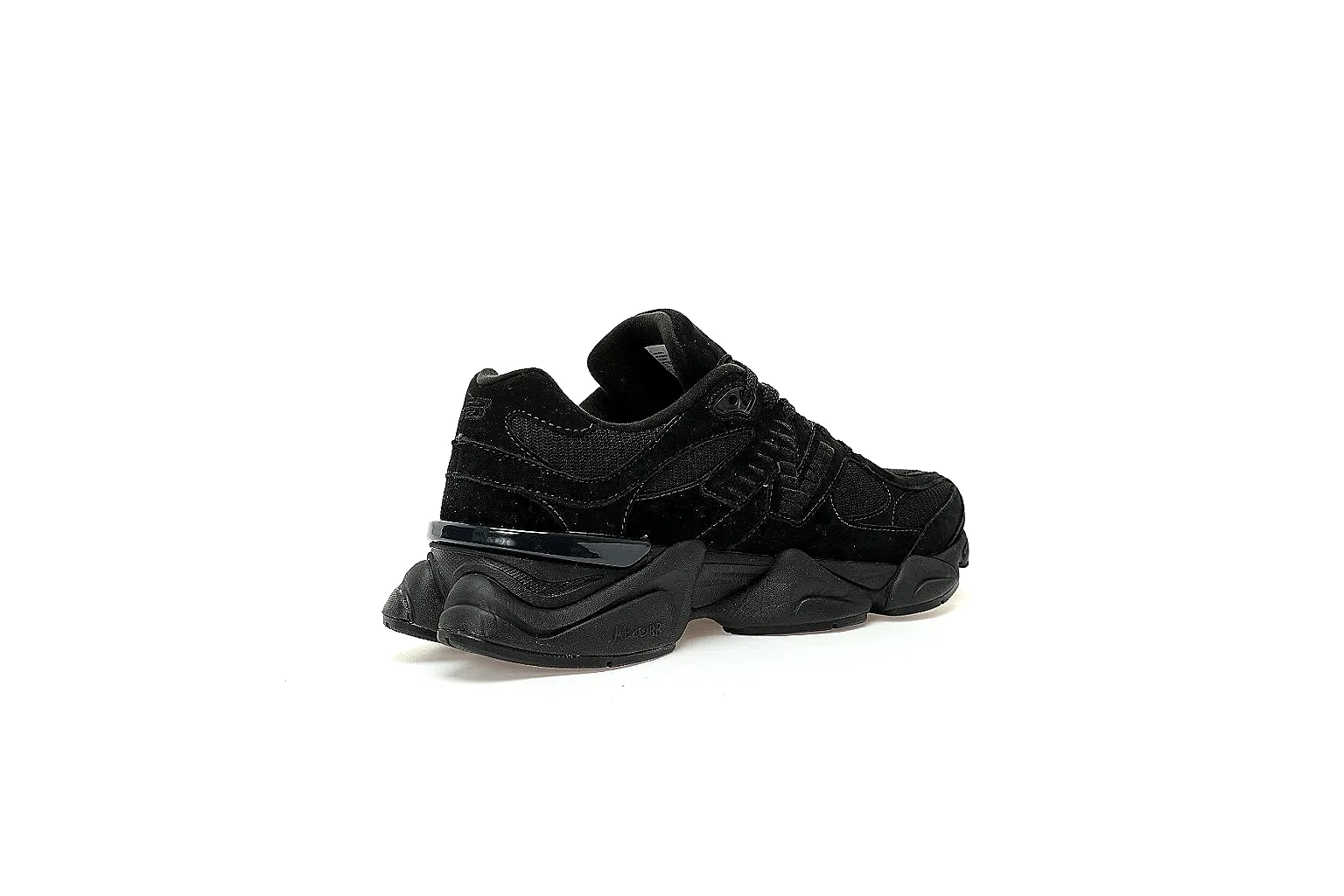 New Balance black runner angled front view showing laces and N logo