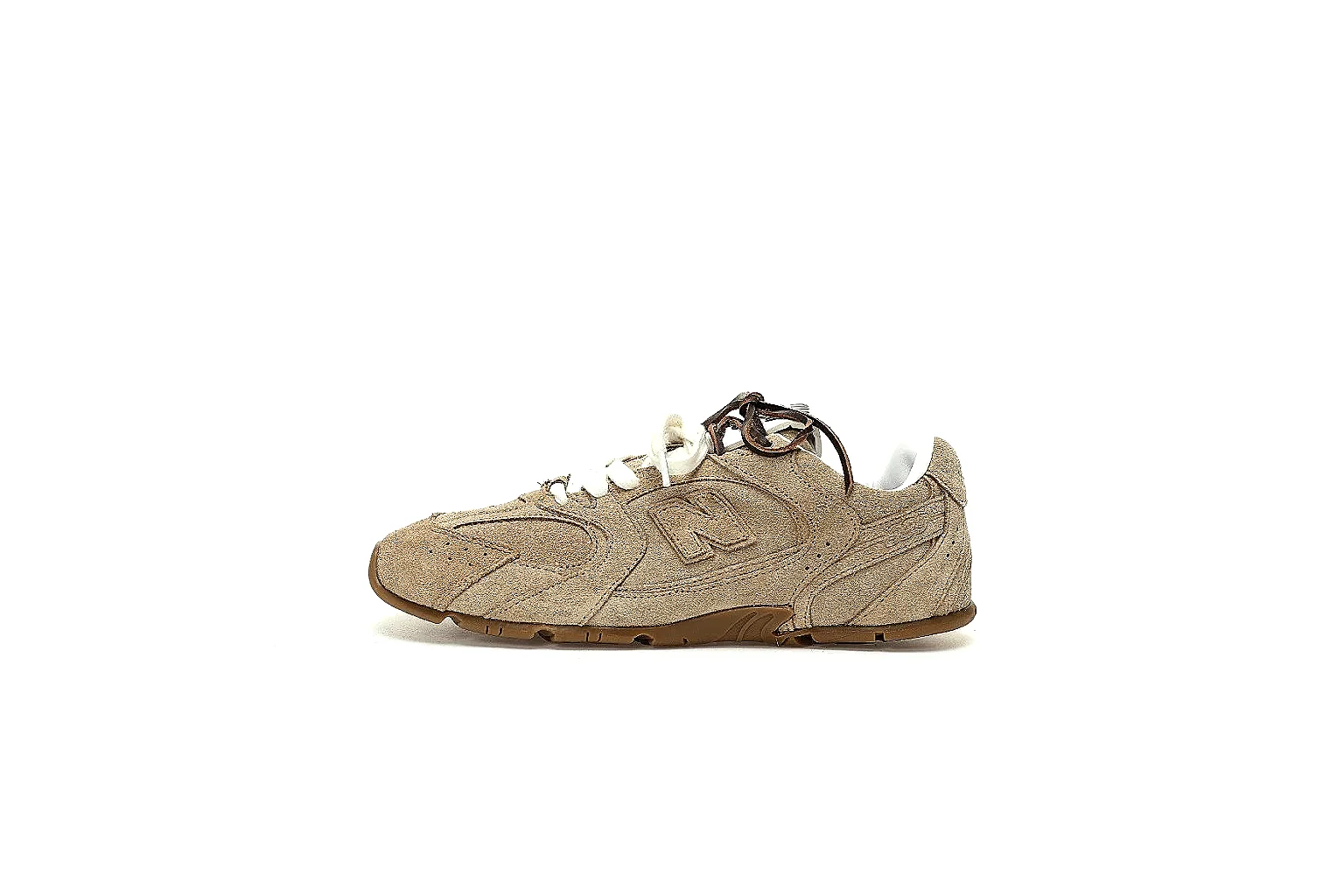 New Balance tan suede-textured low runner side view with gum outsole proof thumbnail 2