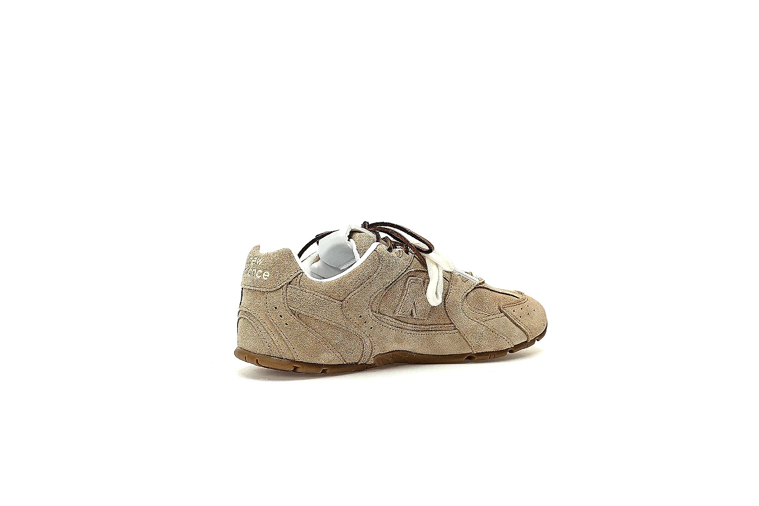 New Balance tan suede-textured low runner side view with gum outsole proof