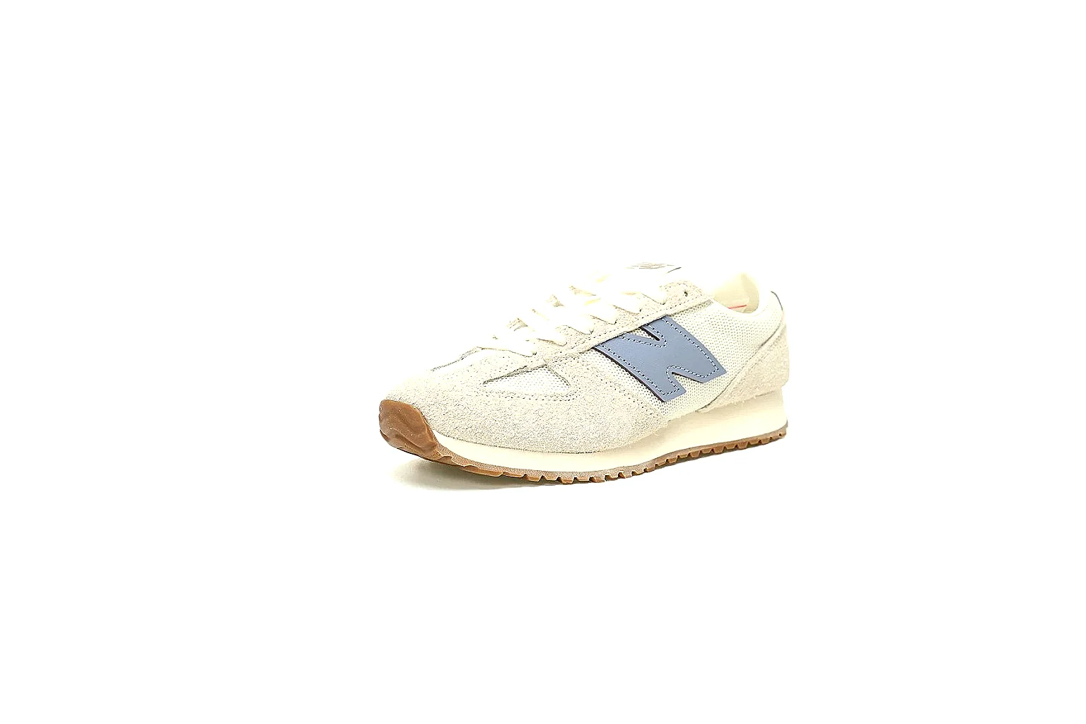 New Balance cream blue runner with visible N logo and gum sole QC proof