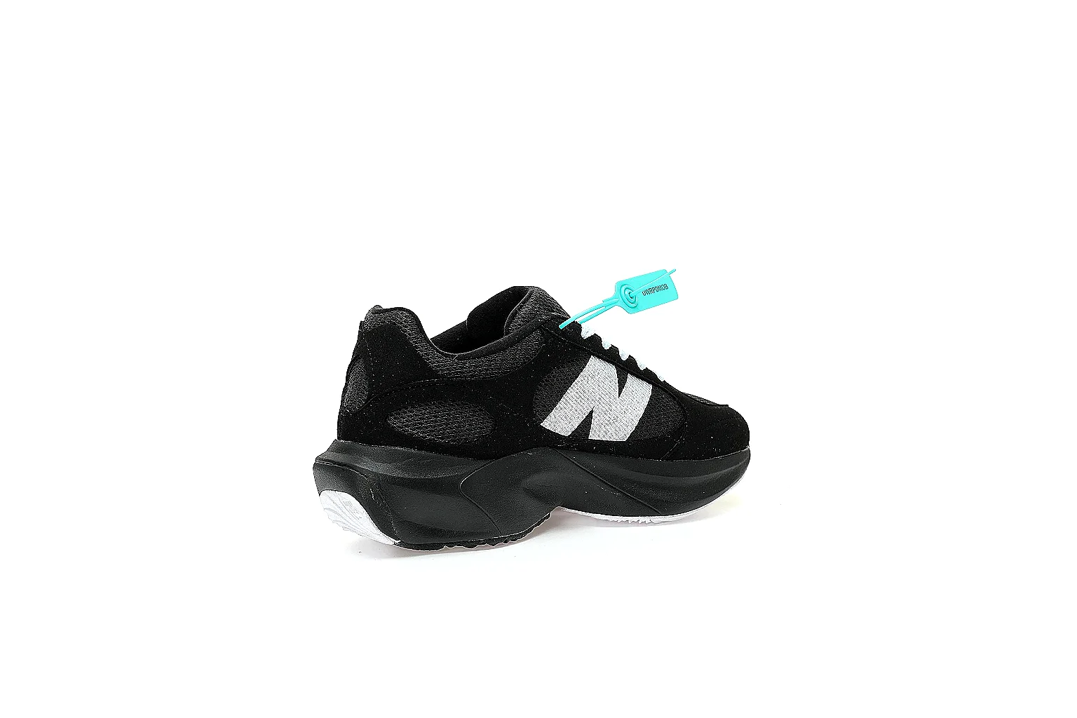 New Balance black lifestyle runner with white N logo shown for QC comparison