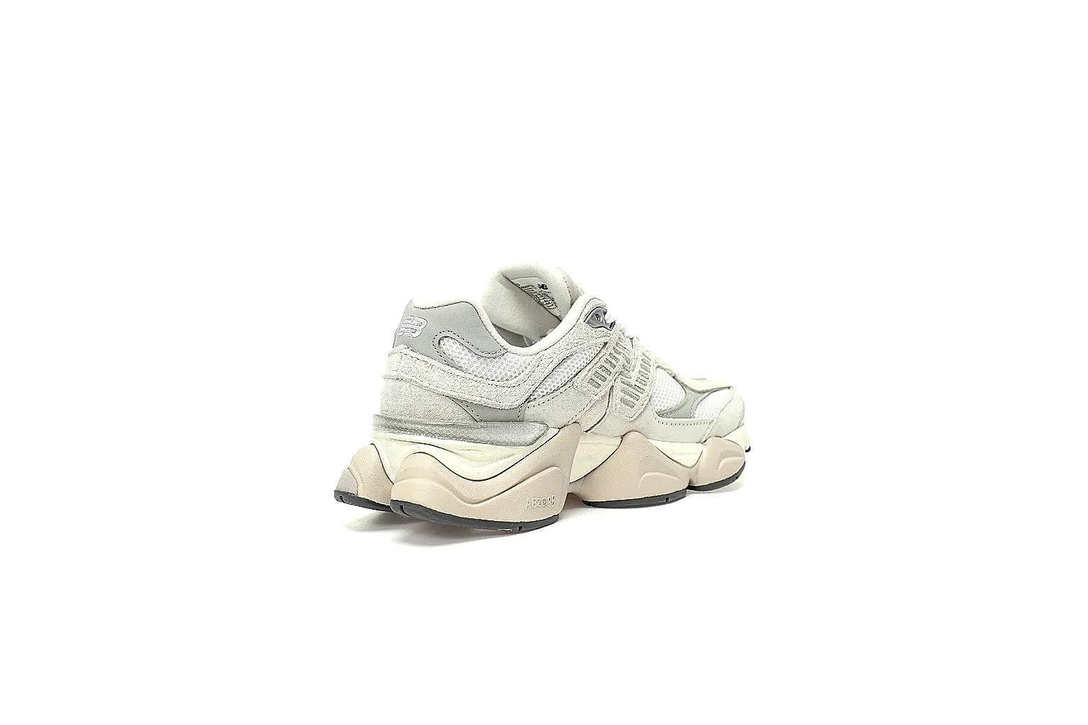 New Balance 9633 cream grey runner with layered sole and visible side logo