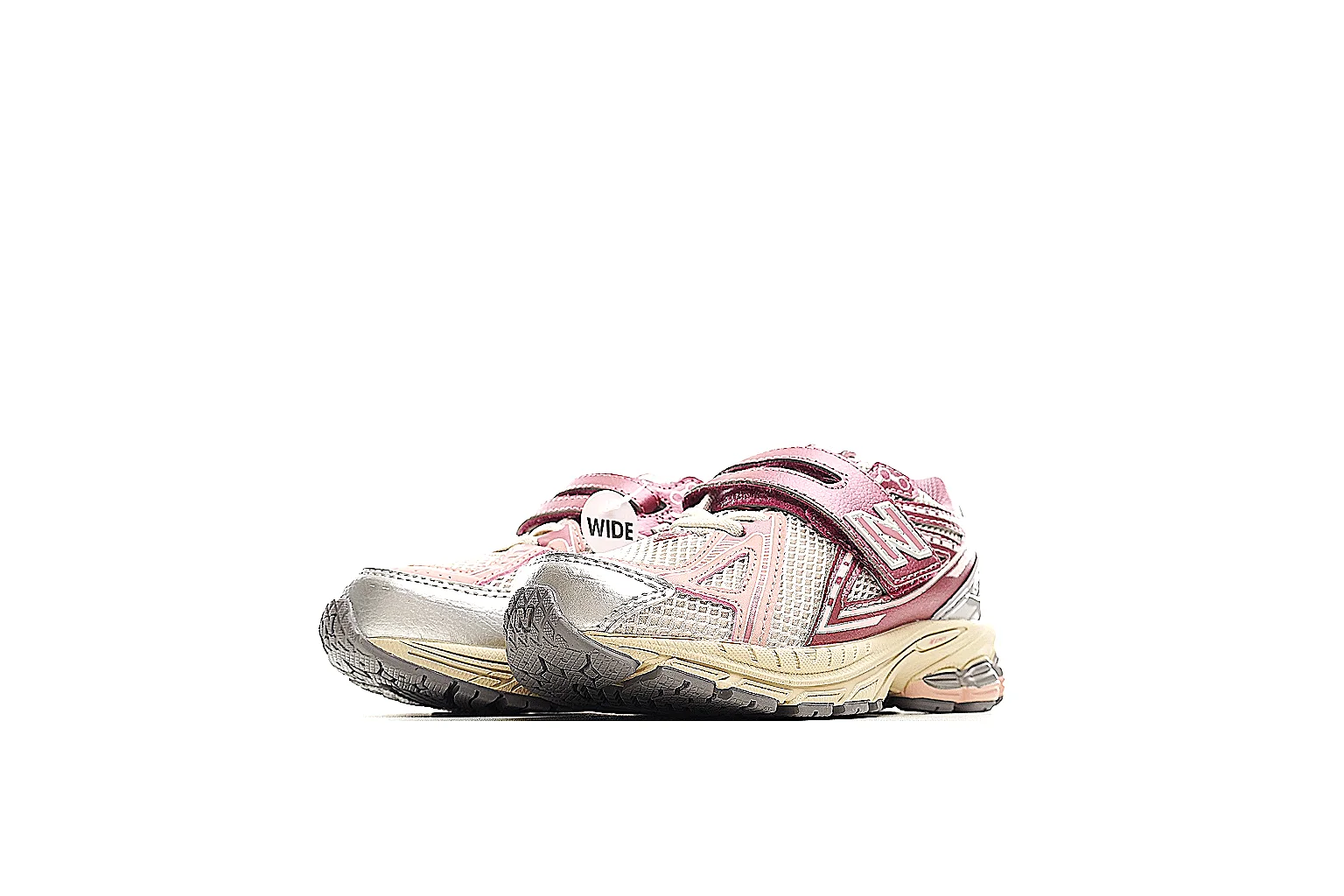 New Balance pink cream runner side profile with strap and N logo thumbnail 6