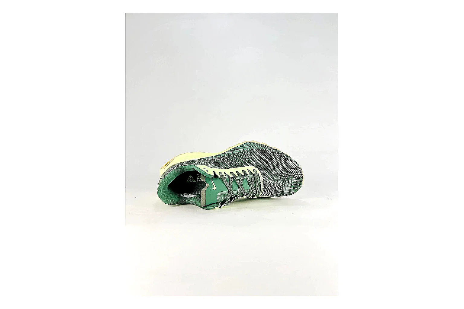 Nike ACG Ultra Green Lime Sneakers comparison signal photo with green lime outdoor sneakers with textile texture, side-profile shape, upper panel lines, and outsole detail