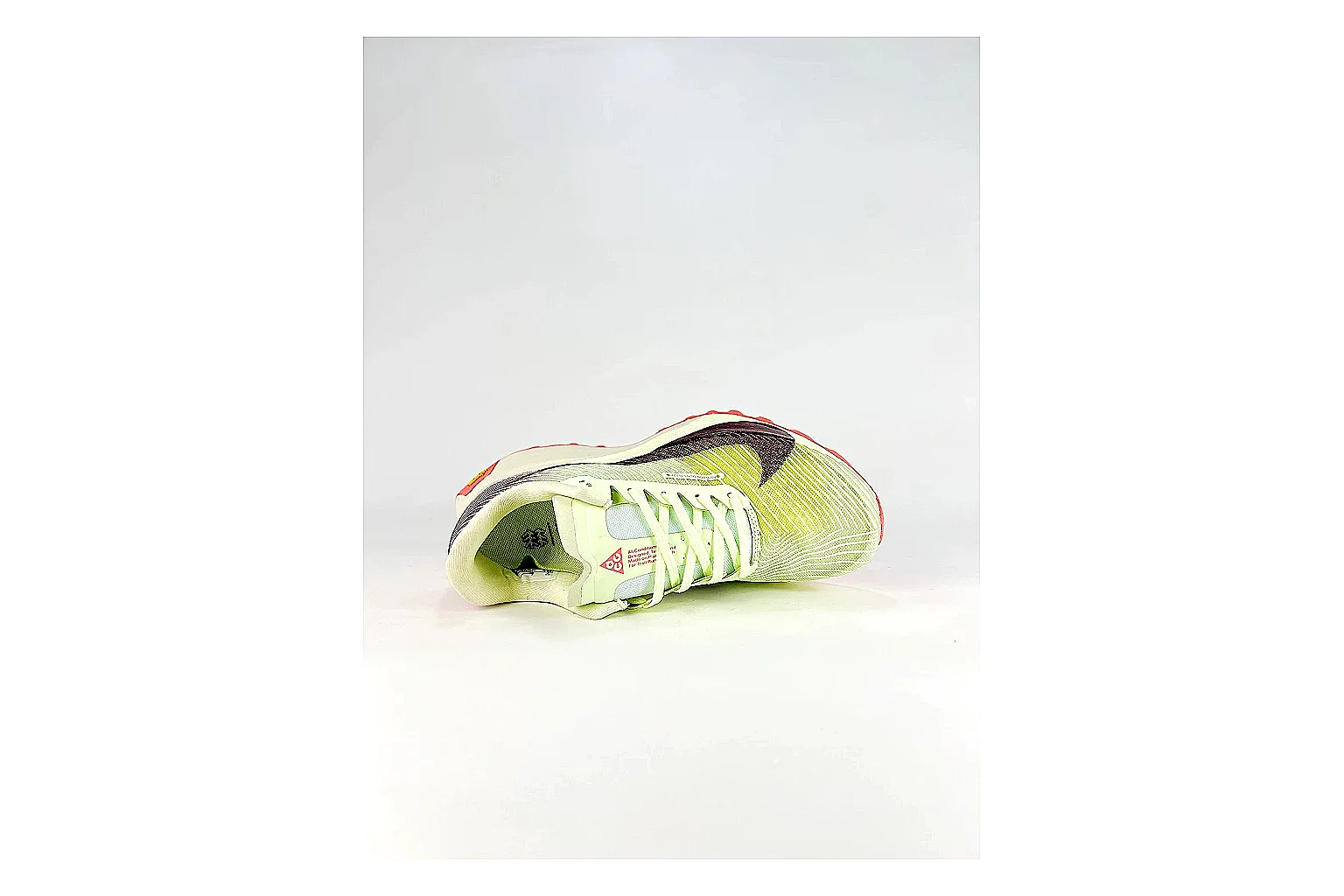 Nike ACG Ultra Lime Pink Sneakers comparison signal photo with lime pink outdoor sneakers with textile texture, side-profile shape, upper panel lines, and outsole detail
