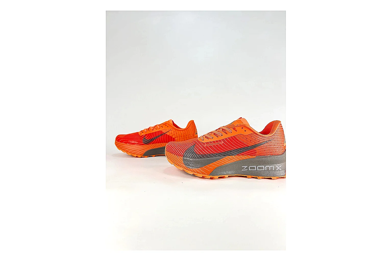 Nike ACG Ultra Orange Gray Sneakers comparison signal photo with orange gray outdoor sneakers with textile texture, side-profile shape, upper panel lines, and outsole detail thumbnail 5