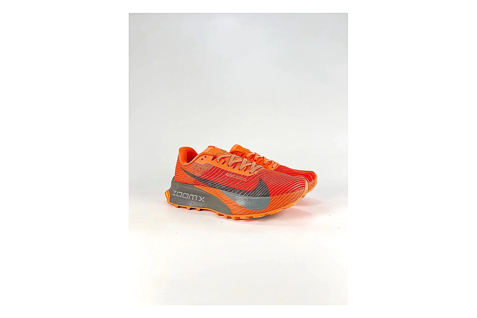 Nike ACG Ultra Orange Gray Sneakers comparison signal photo with orange gray outdoor sneakers with textile texture, side-profile shape, upper panel lines, and outsole detail thumbnail 6