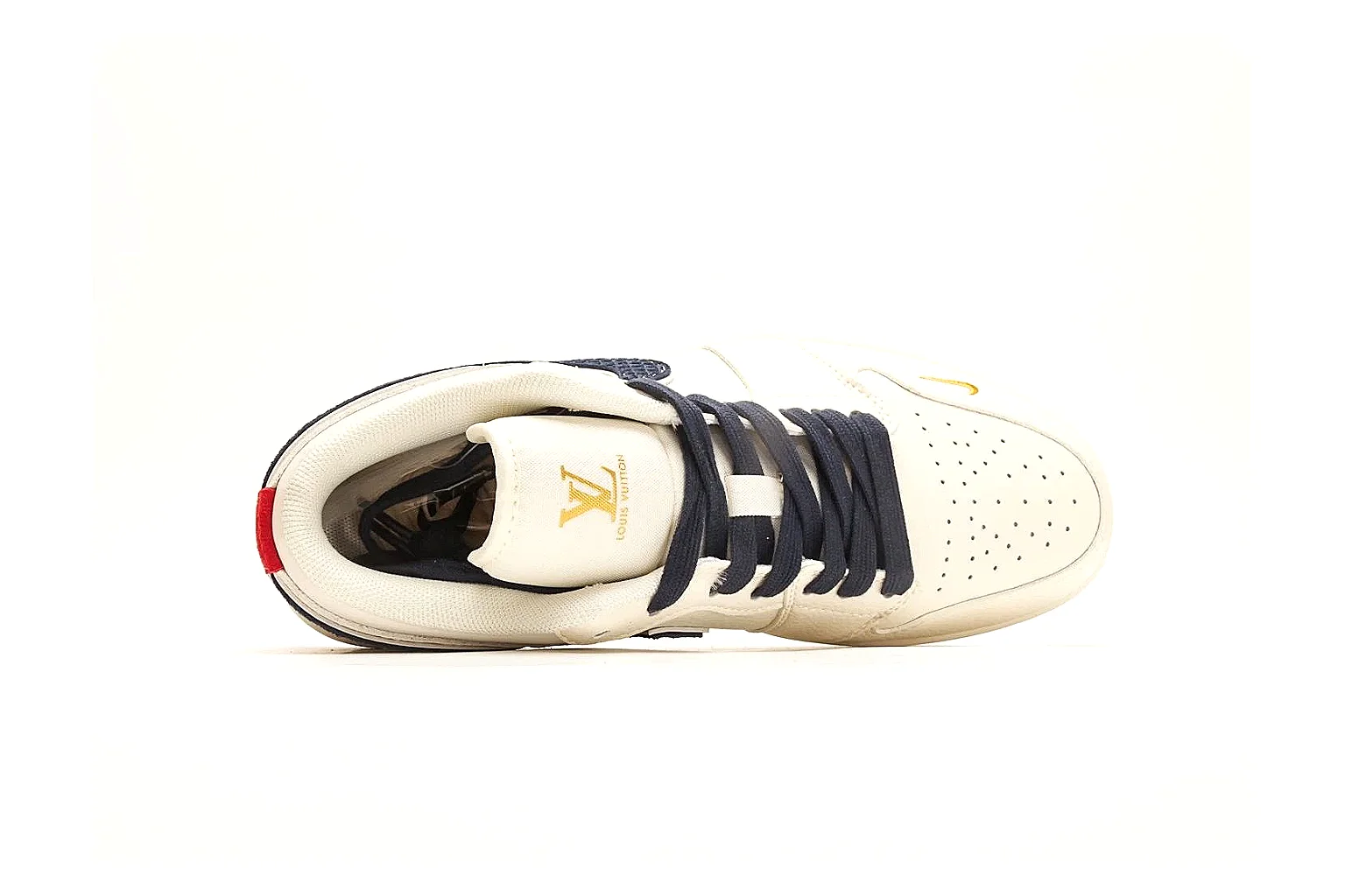 Nike Air Court Cream Navy Low Top comparison photo showing cream leather upper, navy Swoosh, dark laces, red heel accents, and gold side graphics thumbnail 2