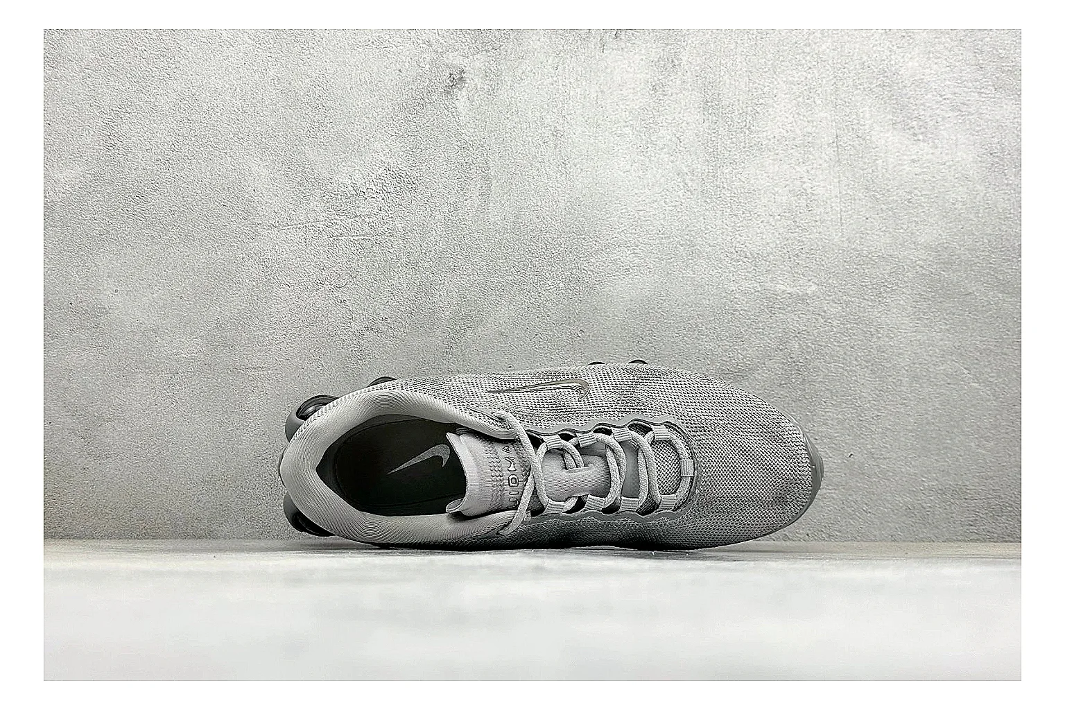 Nike Air Liquid Metal Silver comparison image with reflective silver upper, running-inspired panels, sculpted pod outsole, and glossy tech finish
