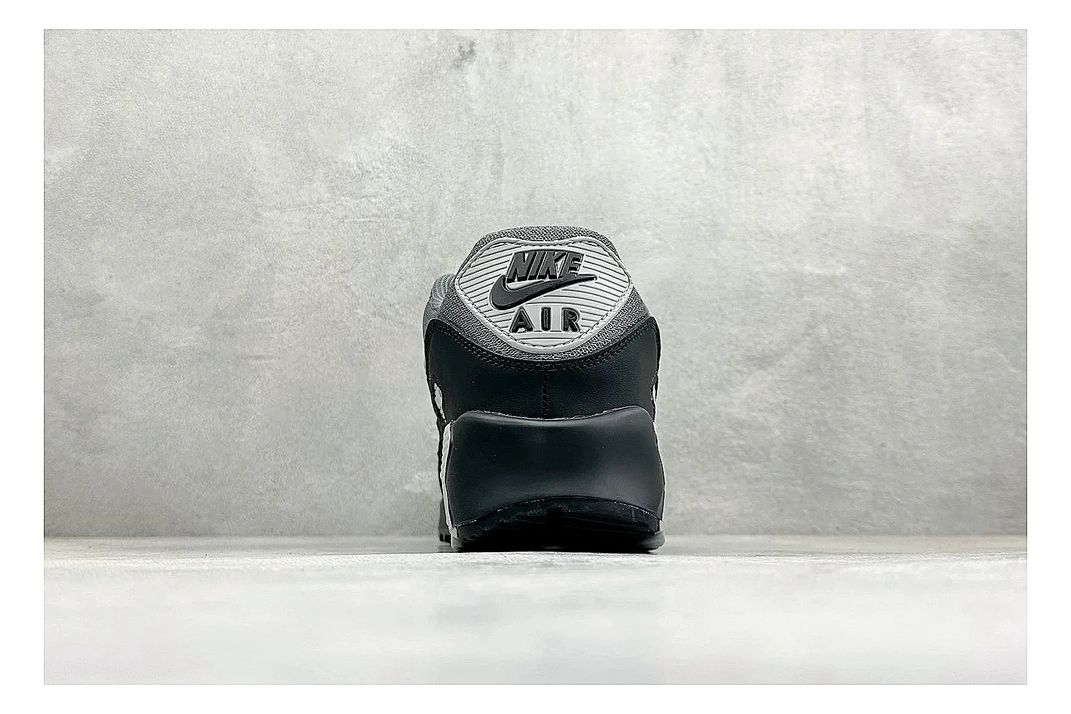 Nike Air Max 90 Grey Black comparison photo showing grey and black layered upper, visible Air window, classic Air Max 90 panels, and sturdy retro sole thumbnail 3