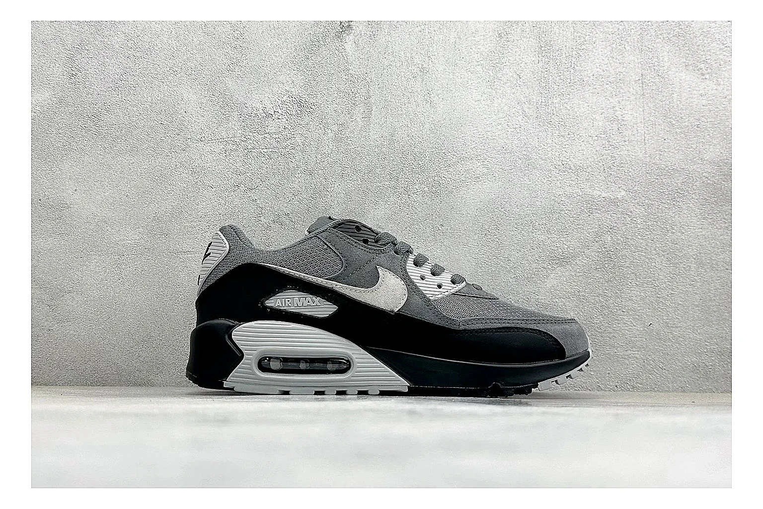 Nike Air Max 90 Grey Black comparison photo showing grey and black layered upper, visible Air window, classic Air Max 90 panels, and sturdy retro sole thumbnail 6