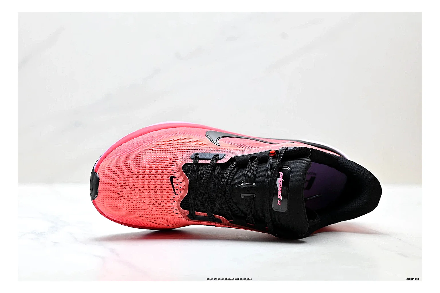 Nike Air Zoom Pegasus Pink Black Sneakers comparison signal photo with pink black running sneakers with mesh texture, side-profile shape, upper panel lines, and outsole detail