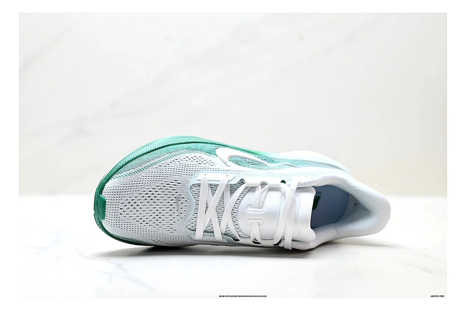 Nike Air Zoom Pegasus White Green Sneakers comparison signal photo with white green running sneakers with mesh texture, side-profile shape, upper panel lines, and outsole detail