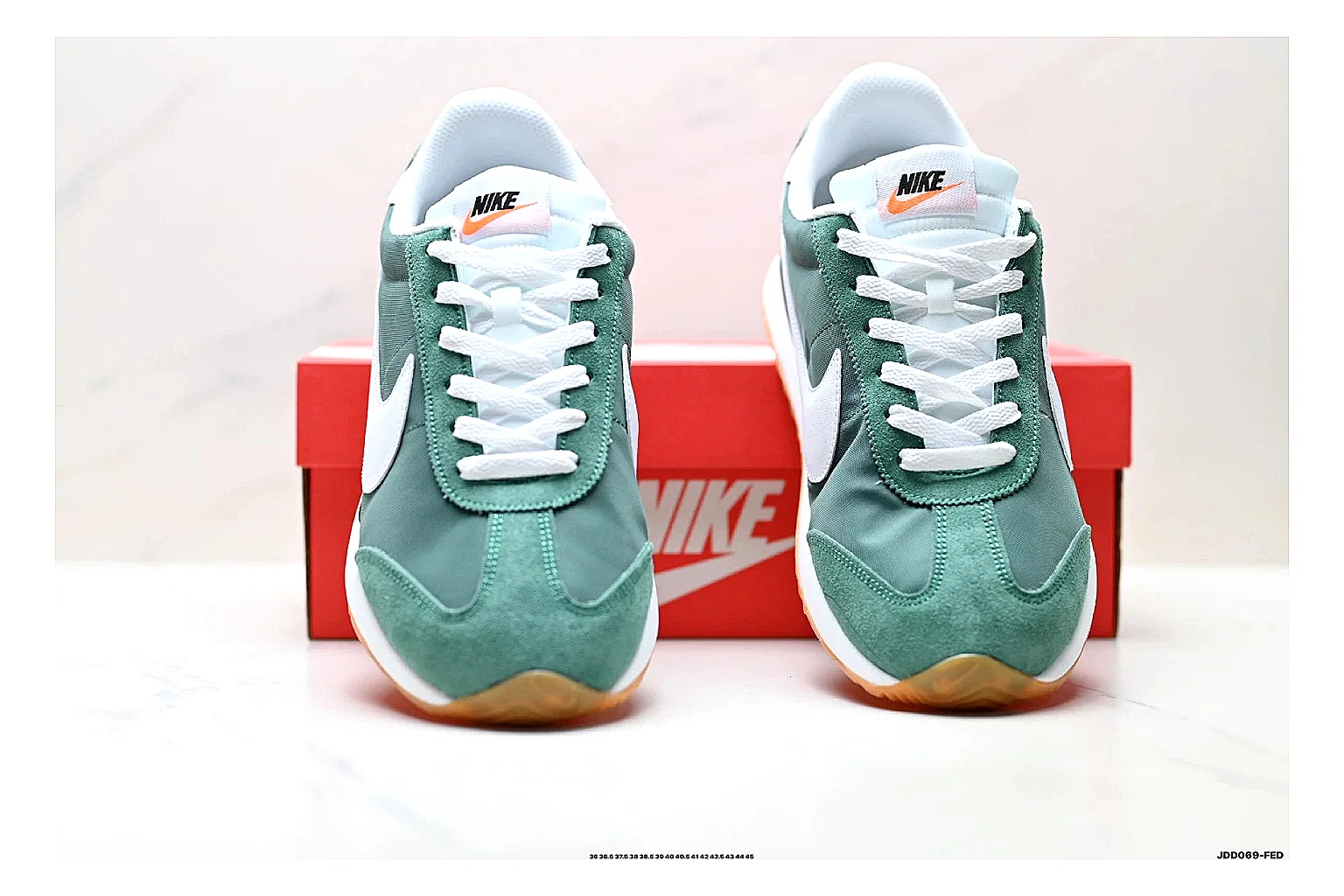 Nike Cortez Green White comparison photo showing green white leather low-top upper, slim retro runner profile, Swoosh detail, and classic Cortez sole thumbnail 5
