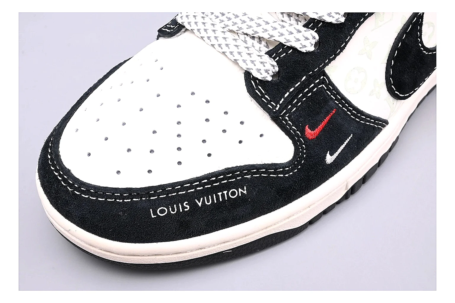 Nike Dunk Low Black White comparison photo showing black and white leather panels, low Dunk silhouette, padded collar, and basketball-retro sole thumbnail 5