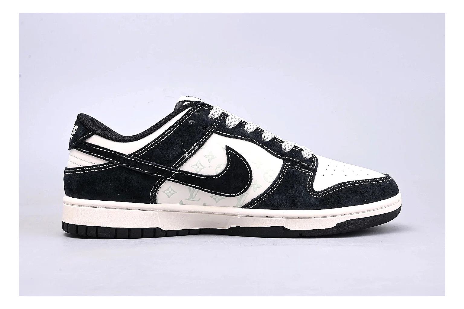 Nike Dunk Low Black White comparison photo showing black and white leather panels, low Dunk silhouette, padded collar, and basketball-retro sole thumbnail 6