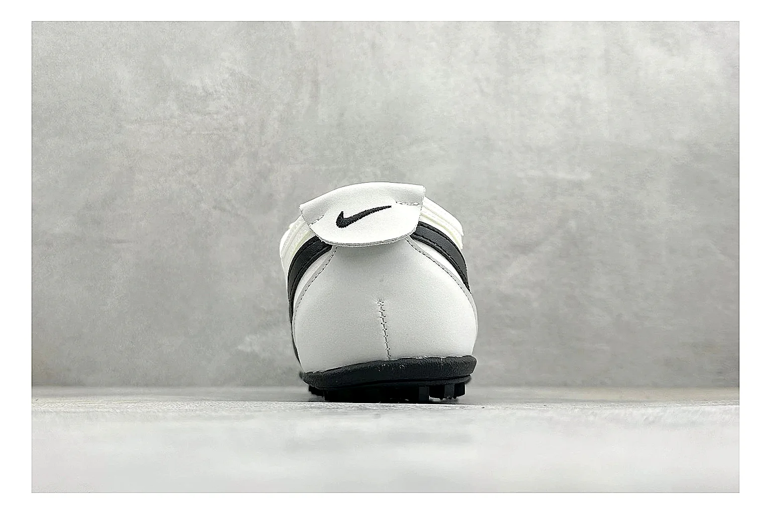 Nike Moon Shoe OG White Black comparison image with white upper, black Swoosh, slim retro runner shape, and waffle-style outsole thumbnail 3
