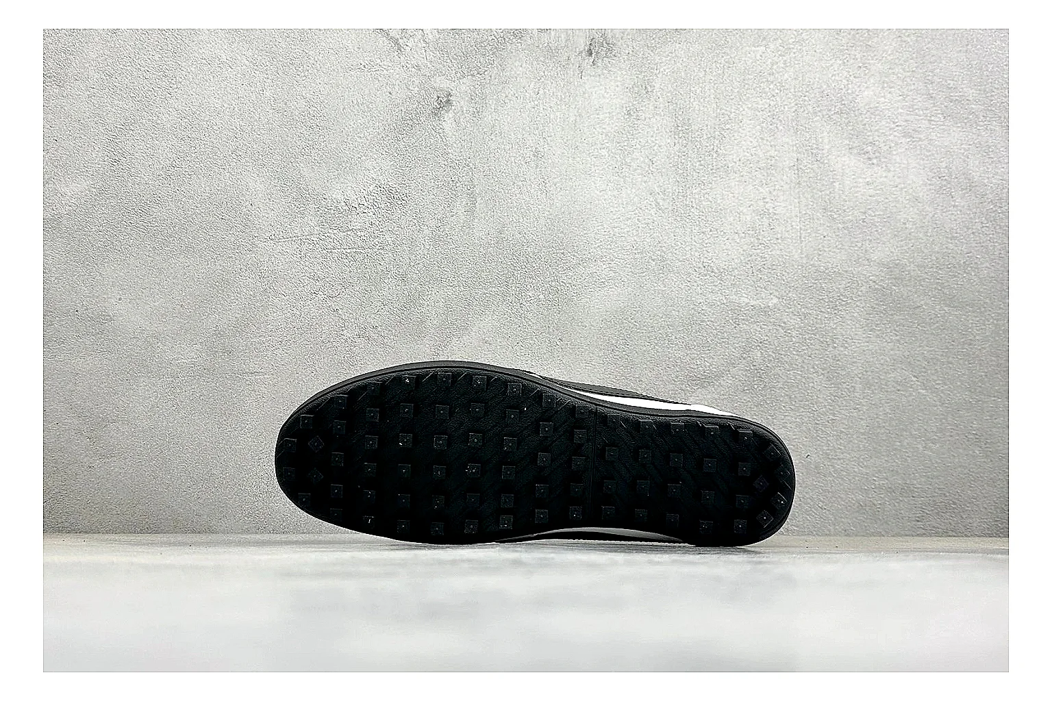 Nike Moon Shoe OG White Black comparison image with white upper, black Swoosh, slim retro runner shape, and waffle-style outsole thumbnail 4