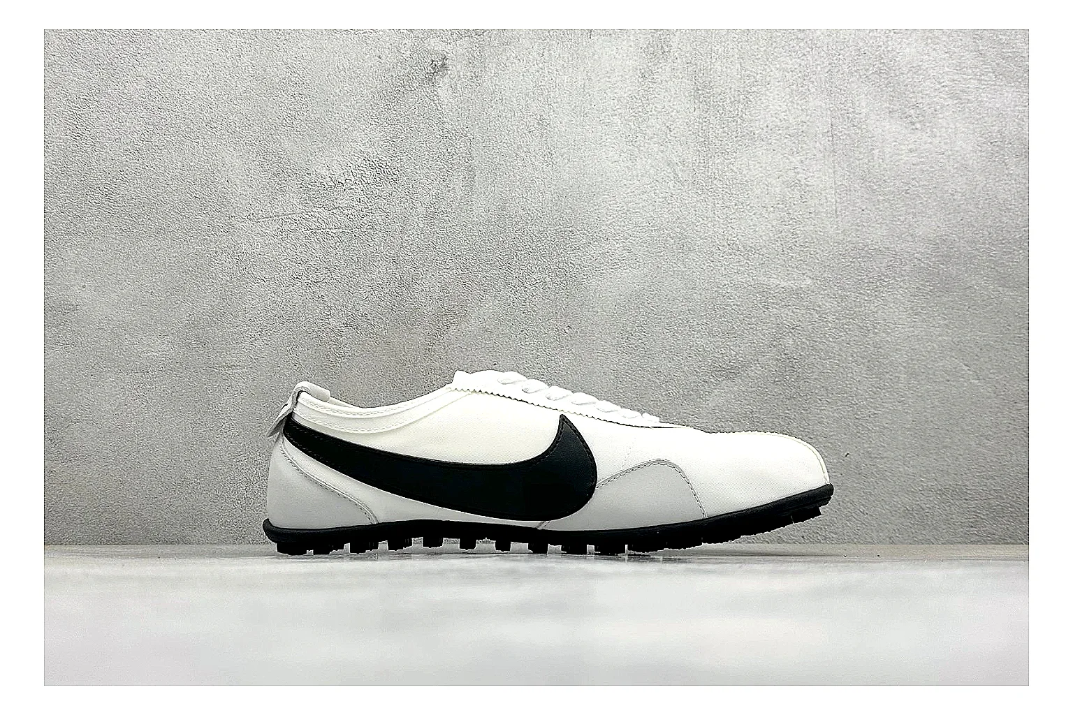 Nike Moon Shoe OG White Black comparison image with white upper, black Swoosh, slim retro runner shape, and waffle-style outsole thumbnail 6