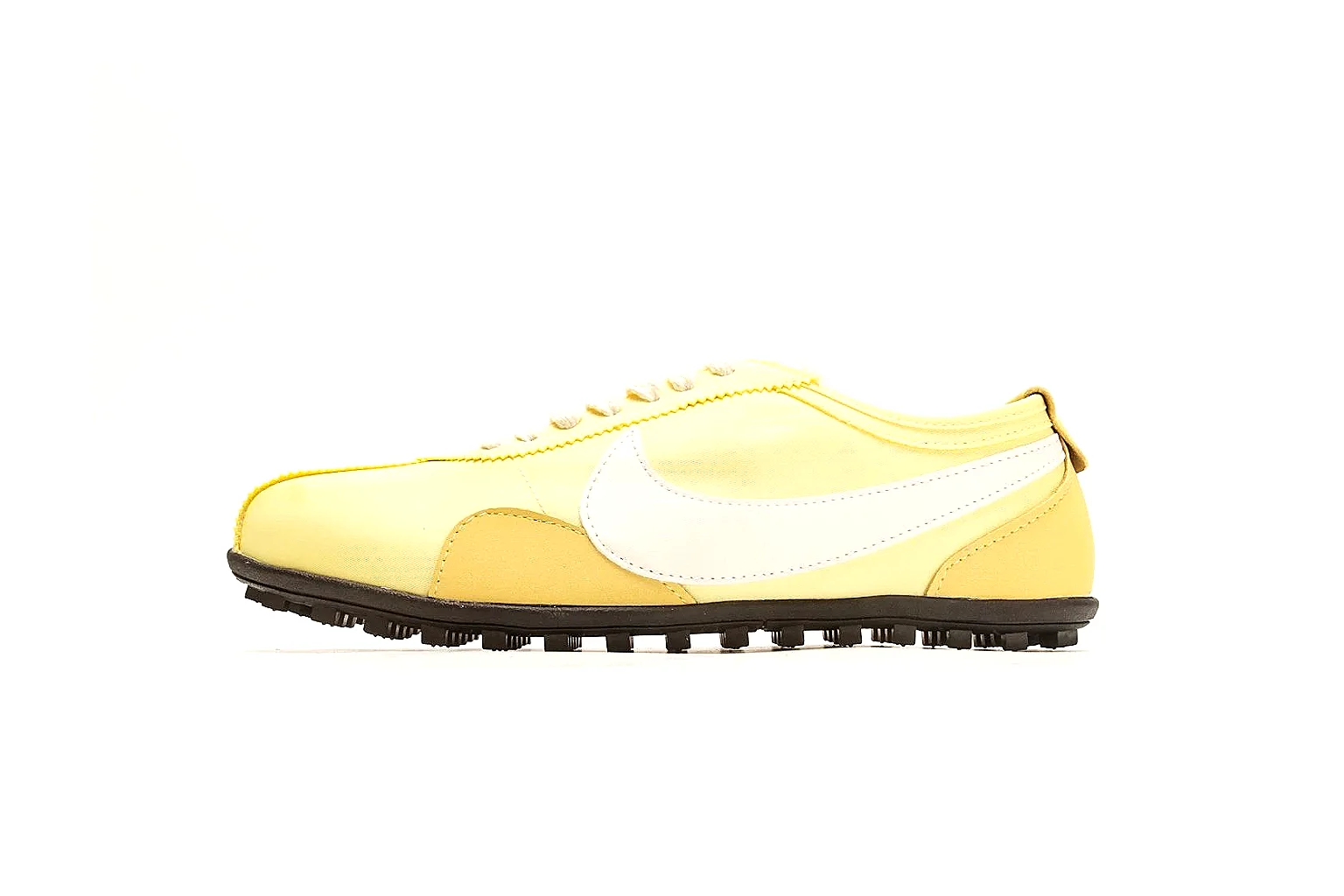 Nike Moon Yellow Retro Runner comparison photo showing yellow slim runner upper, white Swoosh, low retro profile, white midsole, and black waffle outsole