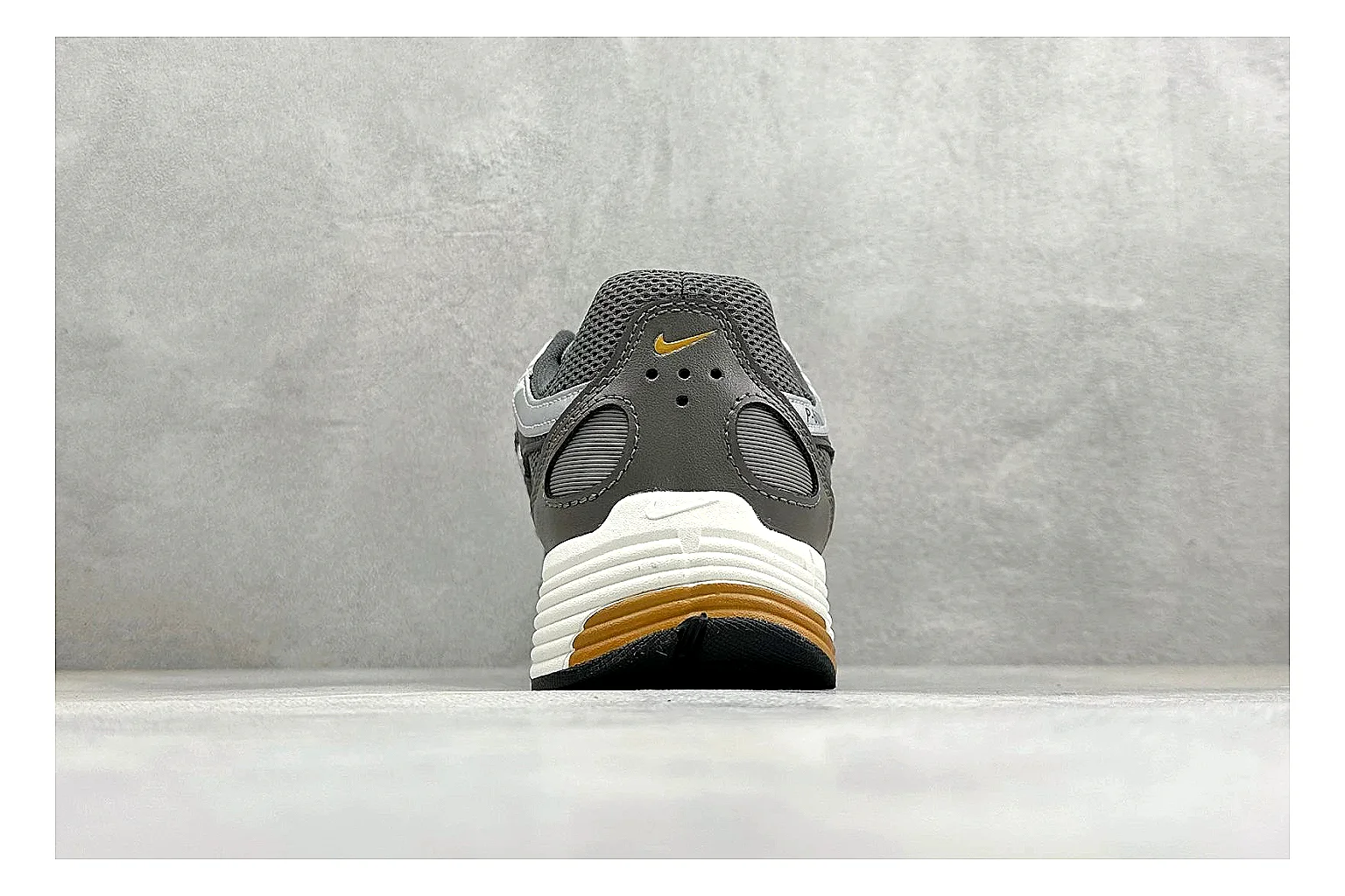 Nike P-6000 Black Orange comparison photo showing black layered runner upper, orange accent hits, retro P-6000 paneling, and cushioned casual sole thumbnail 3