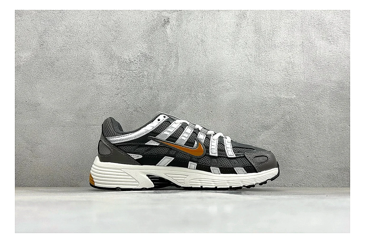 Nike P-6000 Black Orange comparison photo showing black layered runner upper, orange accent hits, retro P-6000 paneling, and cushioned casual sole thumbnail 6