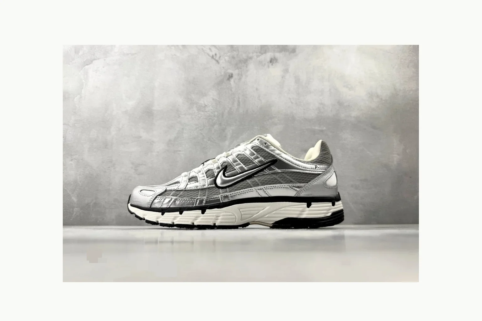 Nike P-6000 Silver Grey Sneaker comparison signal photo with grey silver p-6000 runner with mixed upper and runner shape