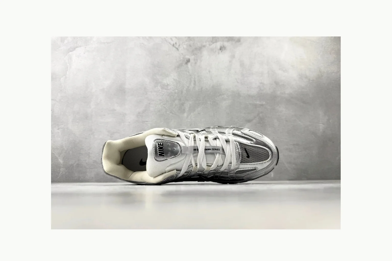 Nike P-6000 Silver Grey Sneaker comparison signal photo with grey silver p-6000 runner with mixed upper and runner shape thumbnail 2