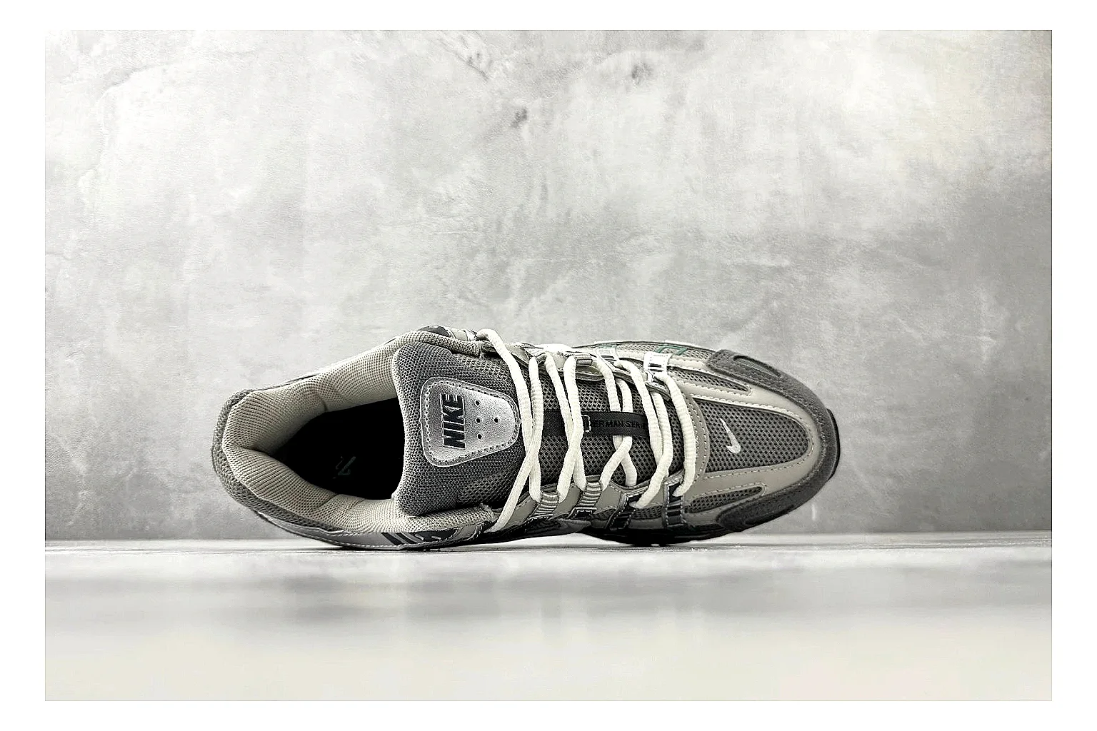 Nike P-6000 White Silver Sneaker comparison signal photo with white silver p-6000 runner with mixed upper and runner shape