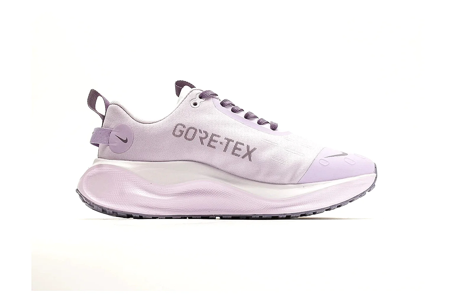 Nike ReactX GORE-TEX Lilac Sneakers comparison photo showing lilac textile upper, small Swoosh, heel pull tabs, cushioned ReactX-style sole, and weather-ready low profile thumbnail 6