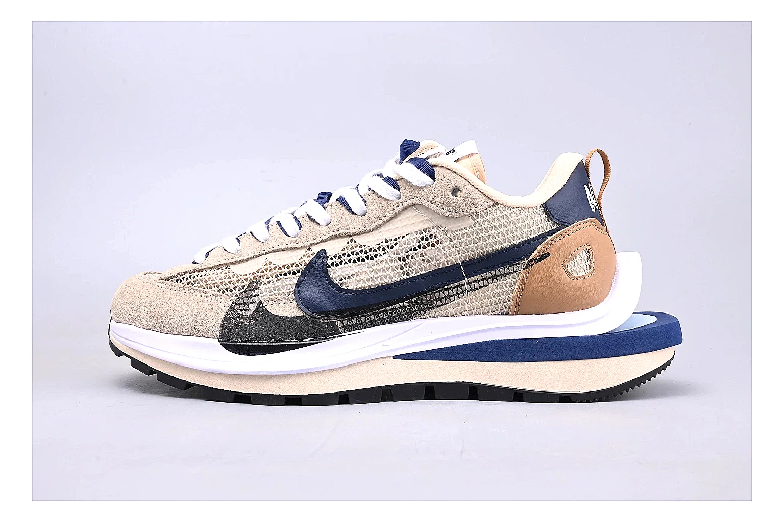 Nike Retro Runner Beige Blue comparison photo showing beige suede-mesh runner upper, blue accent panels, low retro profile, and cushioned running sole