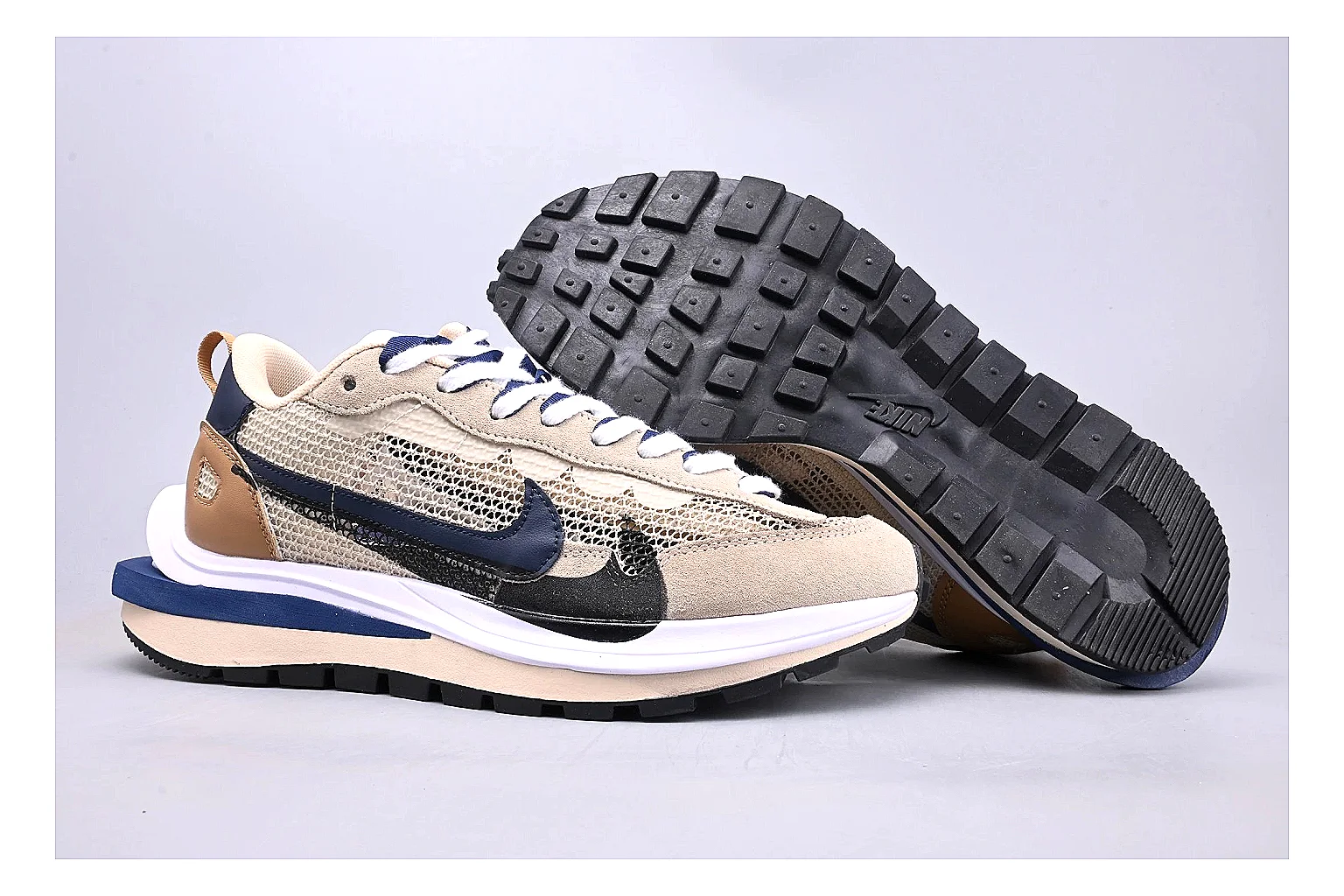 Nike Retro Runner Beige Blue comparison photo showing beige suede-mesh runner upper, blue accent panels, low retro profile, and cushioned running sole thumbnail 3