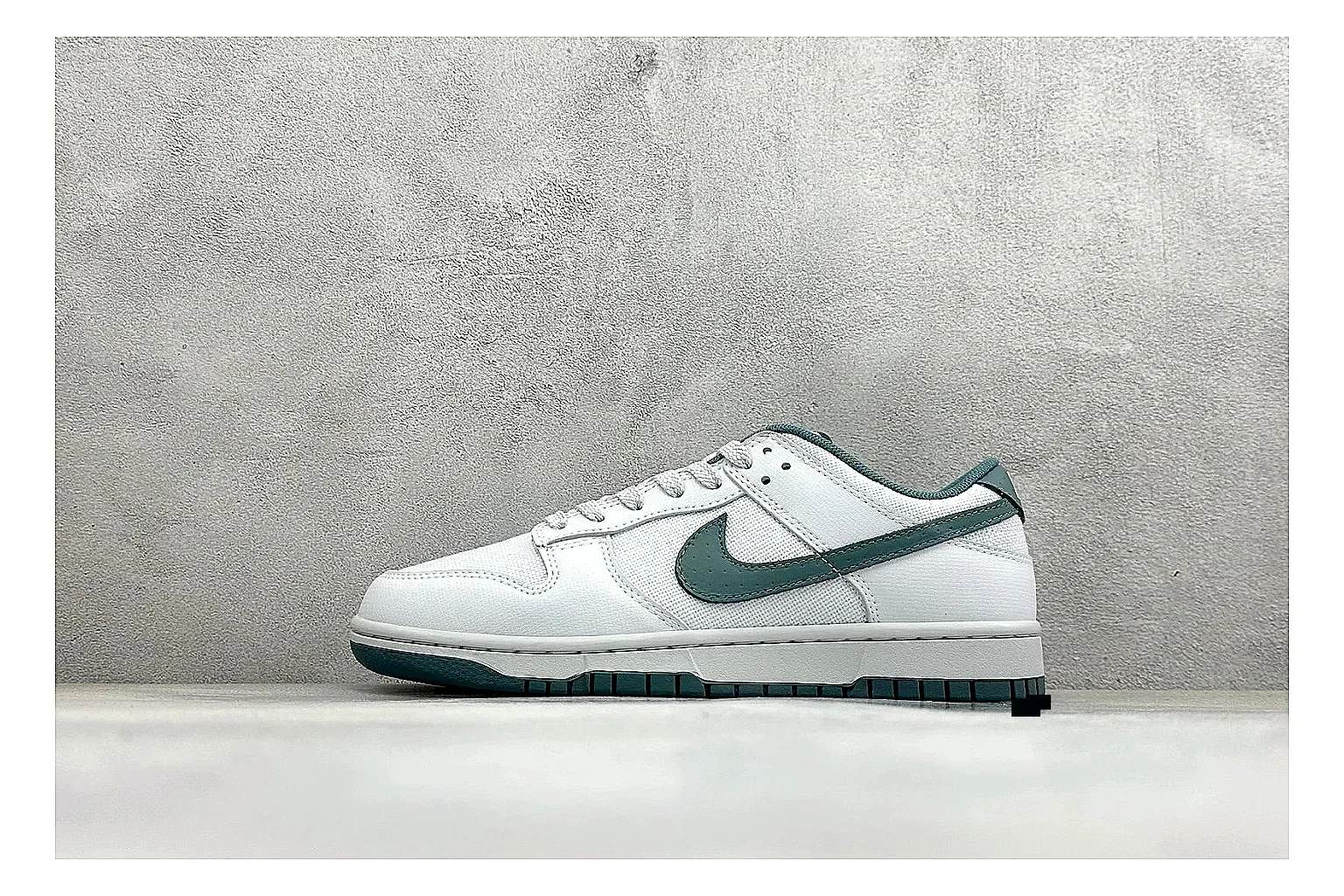 Nike SB Dunk Low White Green comparison photo showing white low-top skate upper, green Swoosh, padded collar, and classic Dunk sole shape