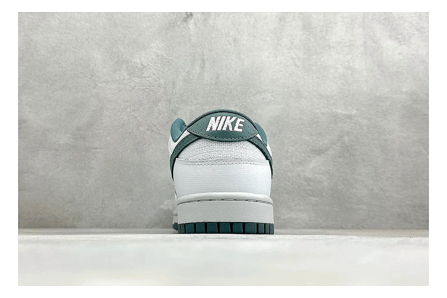 Nike SB Dunk Low White Green comparison photo showing white low-top skate upper, green Swoosh, padded collar, and classic Dunk sole shape thumbnail 3