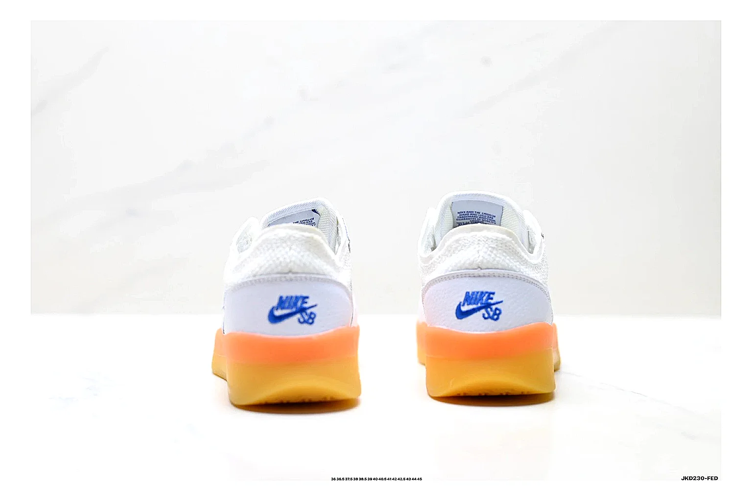 Nike SB PS8 White Blue Sneakers comparison signal photo with white blue skate sneakers with leather texture, side-profile shape, upper panel lines, and outsole detail thumbnail 3