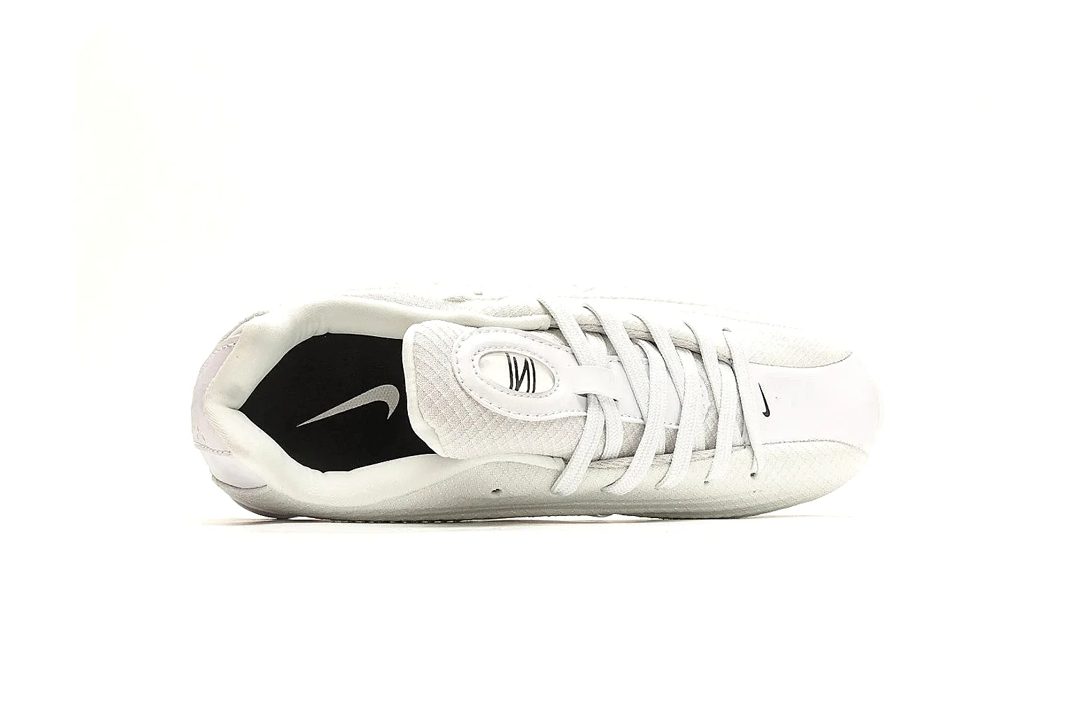 Nike Shox Z White Sneakers comparison photo showing white streamlined layered upper, small Swoosh, black heel cushioning columns, and modern low runner shape