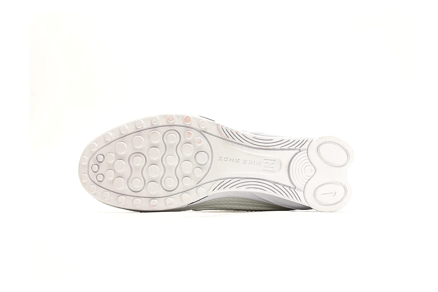 Nike Shox Z White Sneakers comparison photo showing white streamlined layered upper, small Swoosh, black heel cushioning columns, and modern low runner shape thumbnail 4