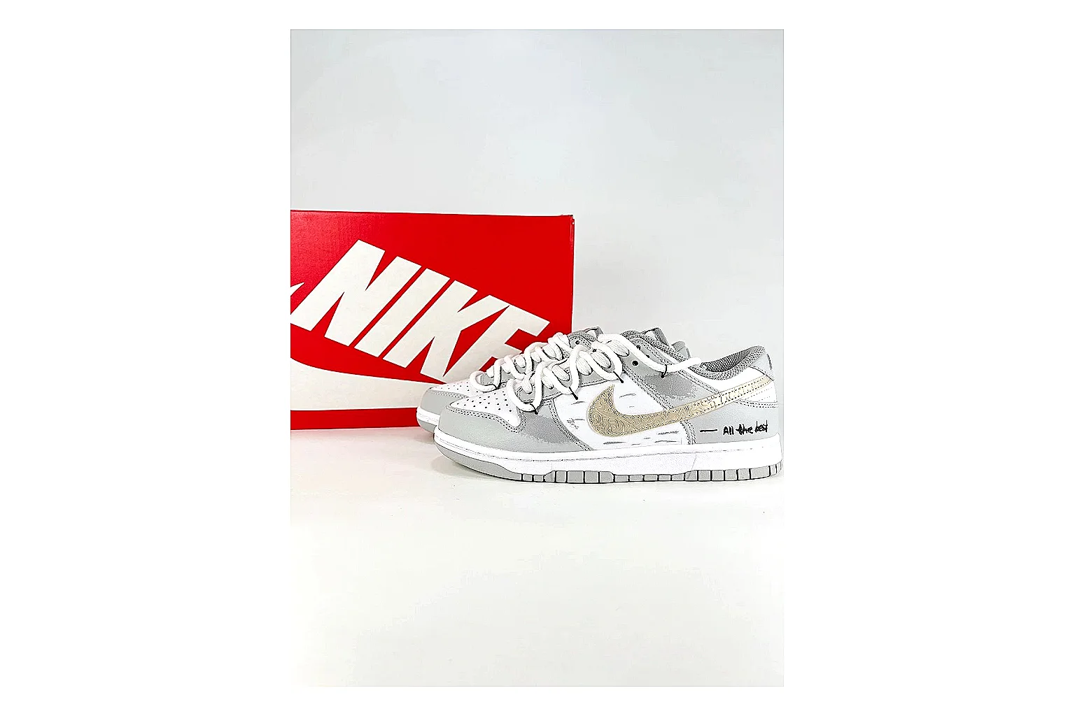 Nike Silver Runner Silver Gold comparison photo showing silver synthetic-mesh upper, gold accent details, modern runner shape, and cushioned sole