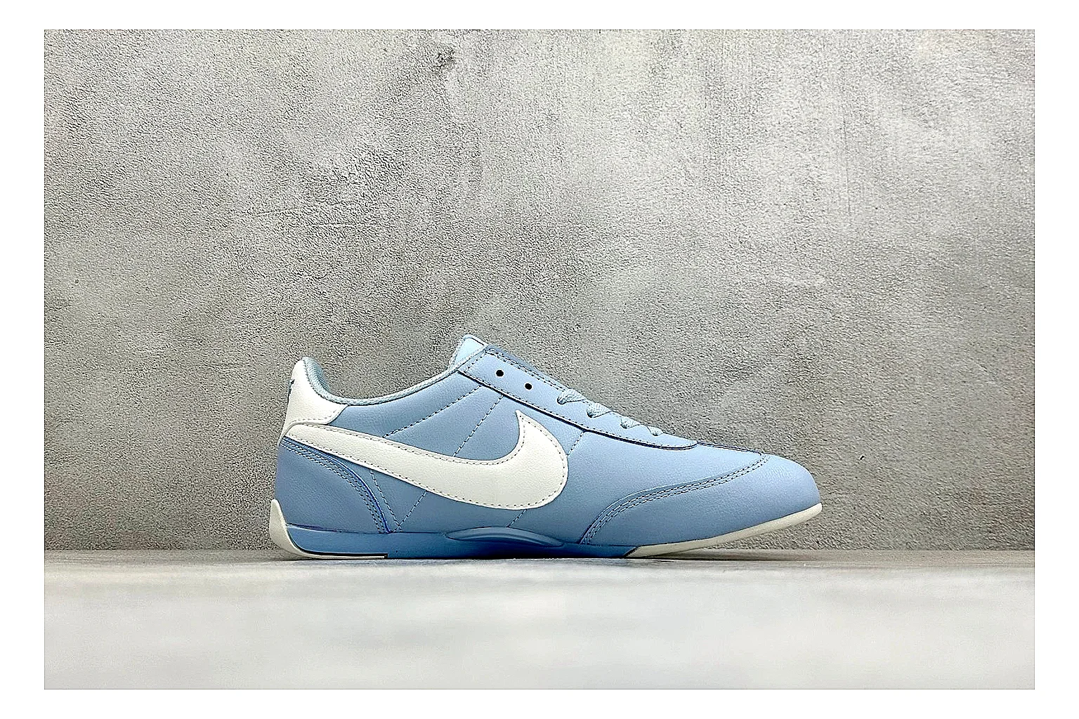 Nike Sprint Sister Light Blue comparison photo showing light blue retro-runner upper, slim side profile, tonal panels, and low everyday sole thumbnail 6